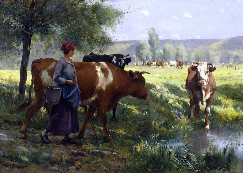 Mujer con vacas